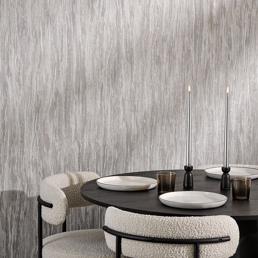 Twilight’s pattern features delicate brushstrokes that sparkle over a metallic foil base, like a constellation in the night sky. The digital printing technique creates subtle variations in opacity, enhancing the color and depth of this elegant and durable type II vinyl wallcovering.