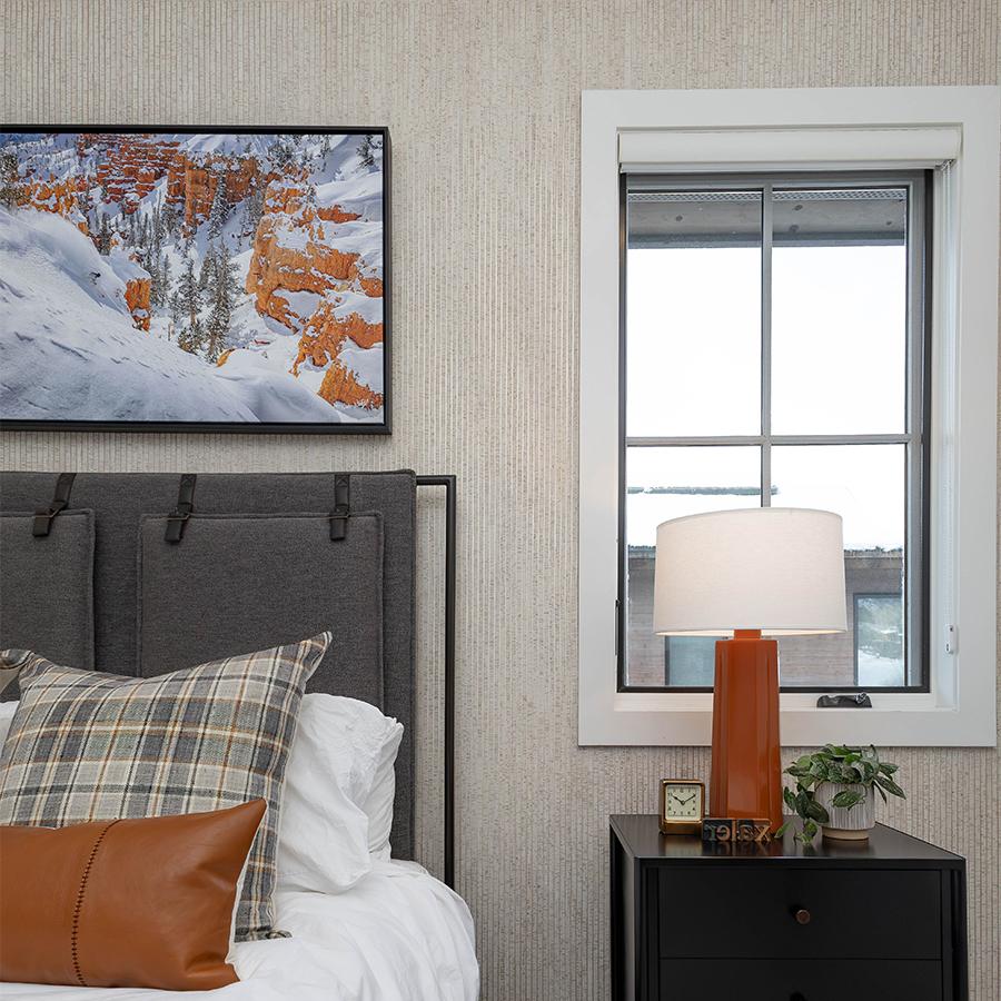 Iberian Stripe features vertical cork strips on metallic foil in gold, silver, or copper tones, meticulously applied by a master craftsperson, giving this bedroom a sophisticated finish.