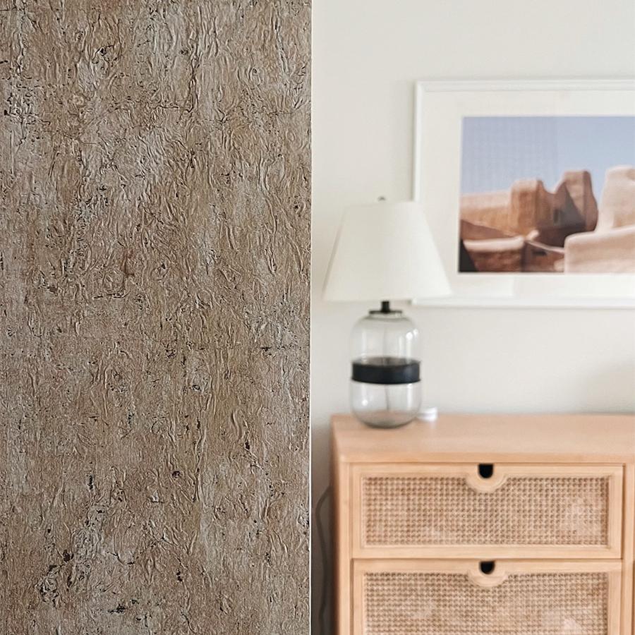 This cork wallcovering creates a soft and stunning aesthetic with the addition of flowing pigments across the surface.